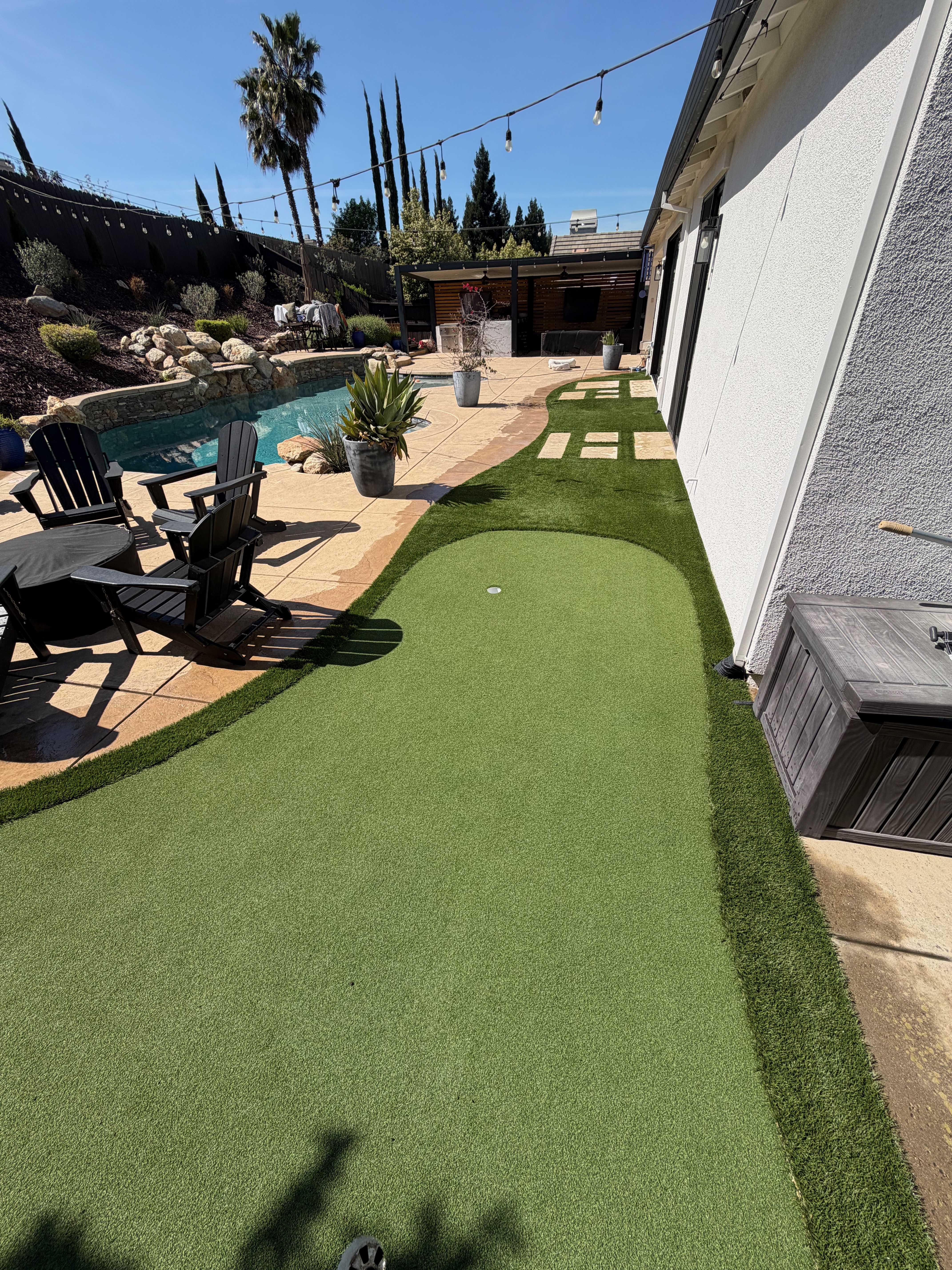 Murphy's Turf — backyard putting green by pool